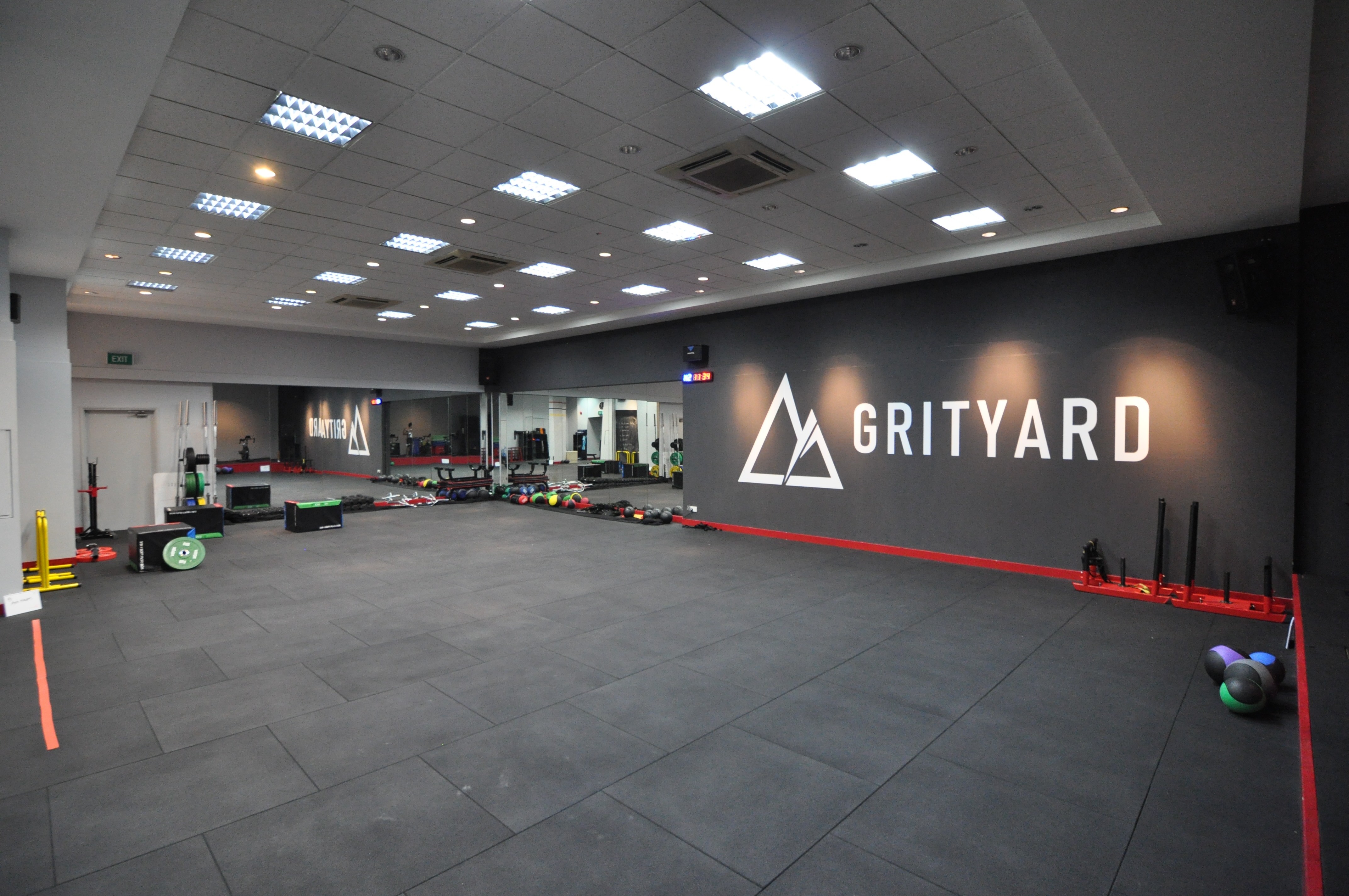 Athletes training on the functional turf track at GRITYARD